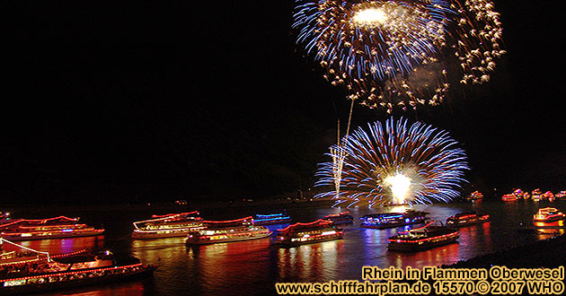 Boat cruise Rhine in Flames near Oberwesel on the Rhine River