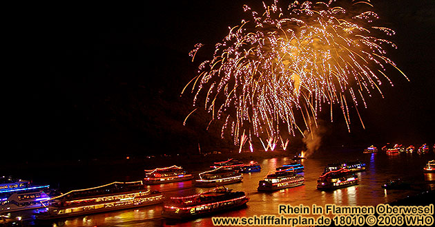 Boat cruise Rhine in Flames near Oberwesel on the Rhine River