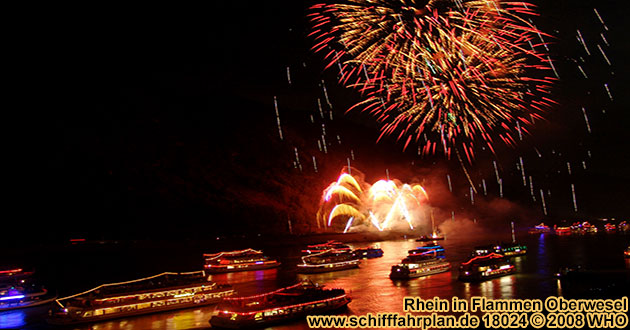 Boat cruise Rhine in Flames near Oberwesel on the Rhine River